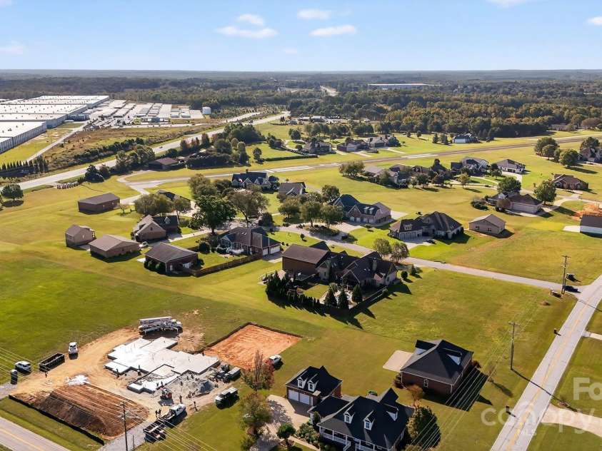 1004 Brockman Road, Greer, SC 29651.  MLS# CAR4312063, YatesRealty ID 226. Aerial Showing Chandelle Airpark View 1