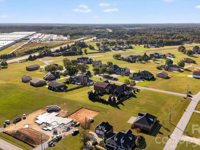 1004 Brockman Road, Greer, SC 29651.  MLS# CAR4312063, YatesRealty ID 226. Aerial Showing Chandelle Airpark View 1
