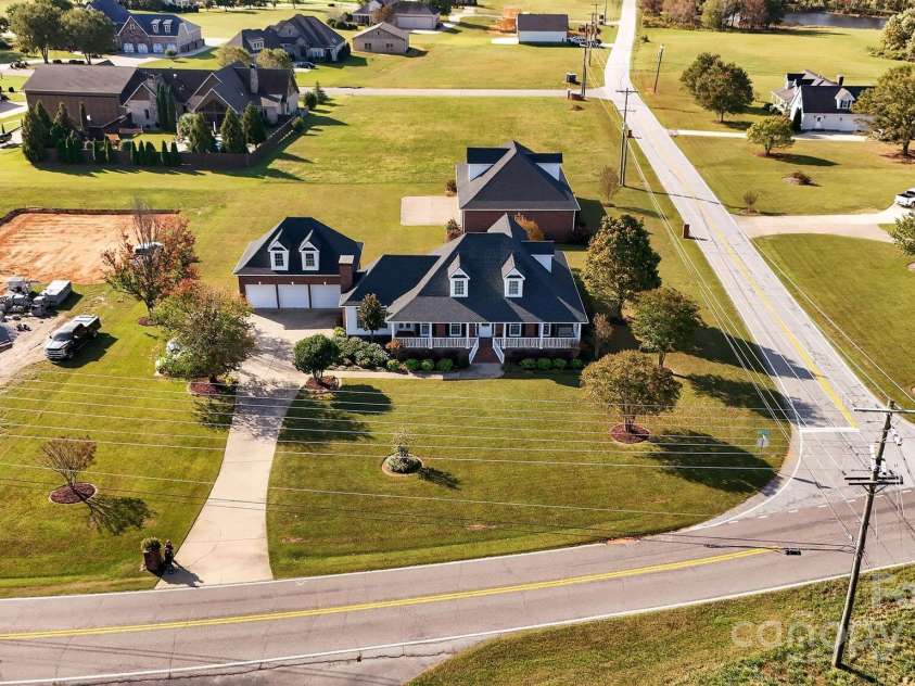 1004 Brockman Road, Greer, SC 29651.  MLS# CAR4312063, YatesRealty ID 226. Aerial Showing Chandelle Airpark View 2