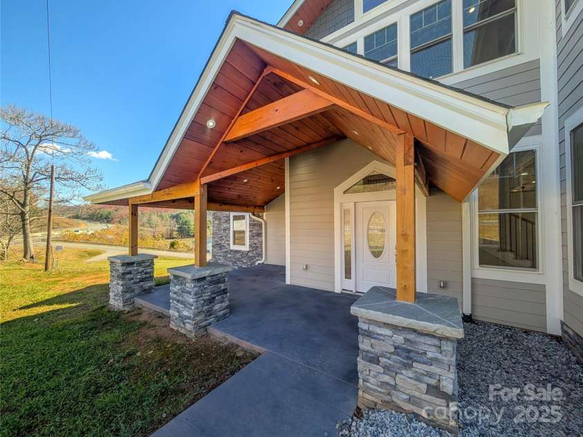 7854 US Highway 19E None, Burnsville, NC 28714.  MLS# CAR4319007, YatesRealty ID 2260. Beautifully designed covered porch entry welcomes you inside!