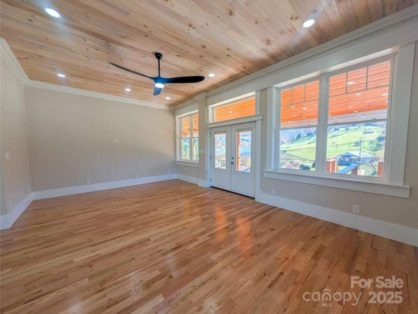 7854 US Highway 19E None, Burnsville, NC 28714.  MLS# CAR4319007, YatesRealty ID 2260. Enjoy beautiful pastoral mountain views from large insulated pela windows in optional living area that also has access to covered back porch!