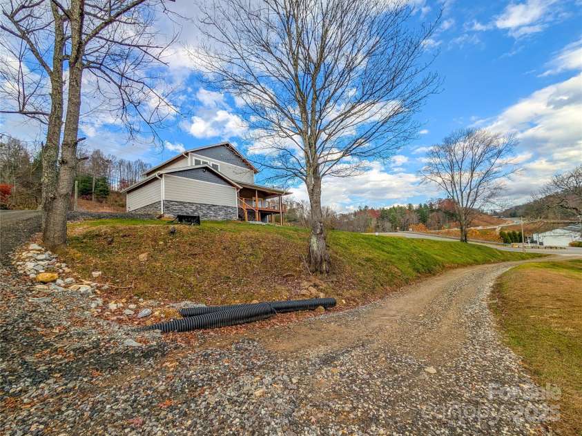 7854 US Highway 19E None, Burnsville, NC 28714.  MLS# CAR4319007, YatesRealty ID 2260. Gravel road from back side of property that connects to Hemlock Rd