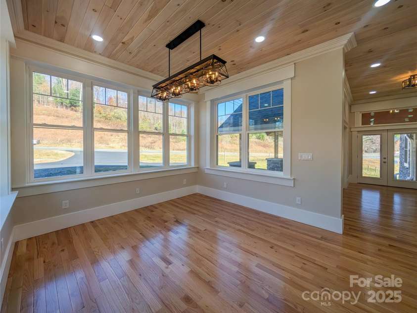 7854 US Highway 19E None, Burnsville, NC 28714.  MLS# CAR4319007, YatesRealty ID 2260. Optional dining area features tongue & groove ceilings, recessed lighting, Wi-fi Smart Switches with dimmers, Pela Insulated Windows that allow abundant natural light!