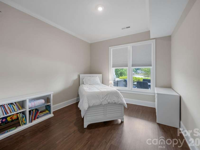 122 Sisters Cove Court, Mooresville, NC 28117.  MLS# CAR4368583, YatesRealty ID 22607. Lower Level Bedroom