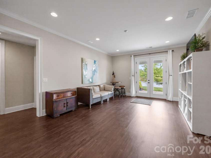 122 Sisters Cove Court, Mooresville, NC 28117.  MLS# CAR4368583, YatesRealty ID 22607. Lower level Great Room