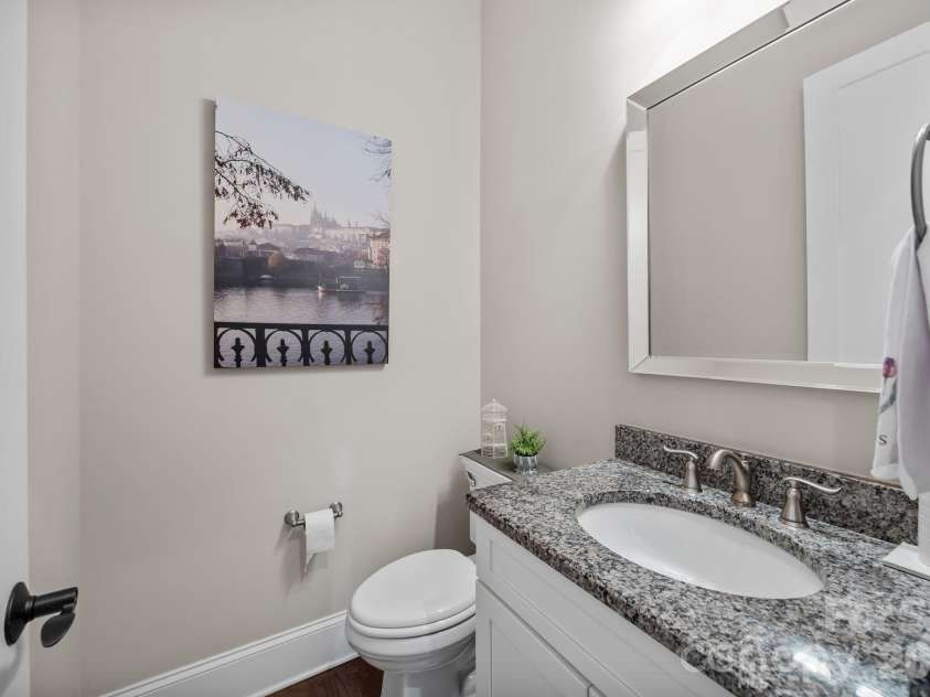 122 Sisters Cove Court, Mooresville, NC 28117.  MLS# CAR4368583, YatesRealty ID 22607. Main Level Powder Room