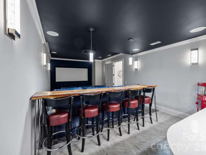 122 Sisters Cove Court, Mooresville, NC 28117.  MLS# CAR4368583, YatesRealty ID 22607. Theater Room