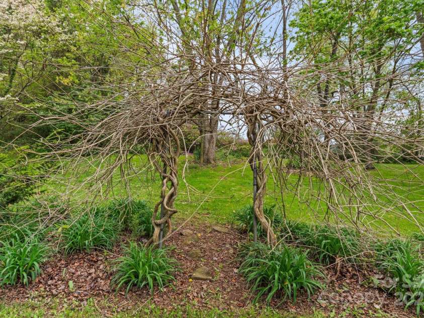 412 Trammell Avenue, Canton, NC 28716.  MLS# CAR4249273, YatesRealty ID 2261. Archway in front yard