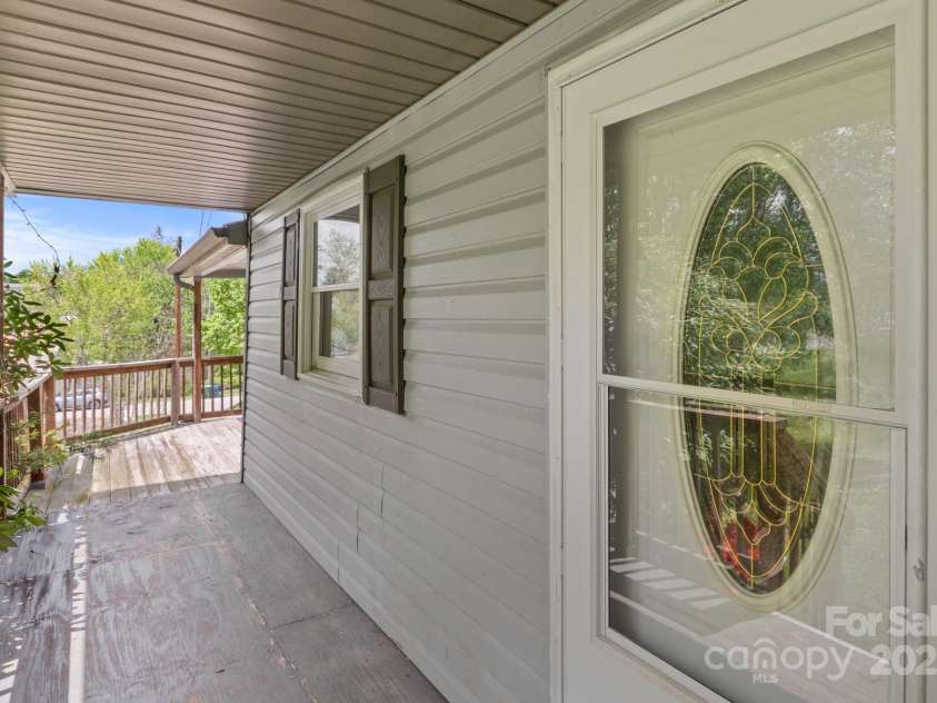 412 Trammell Avenue, Canton, NC 28716.  MLS# CAR4249273, YatesRealty ID 2261. Wrap around front porch