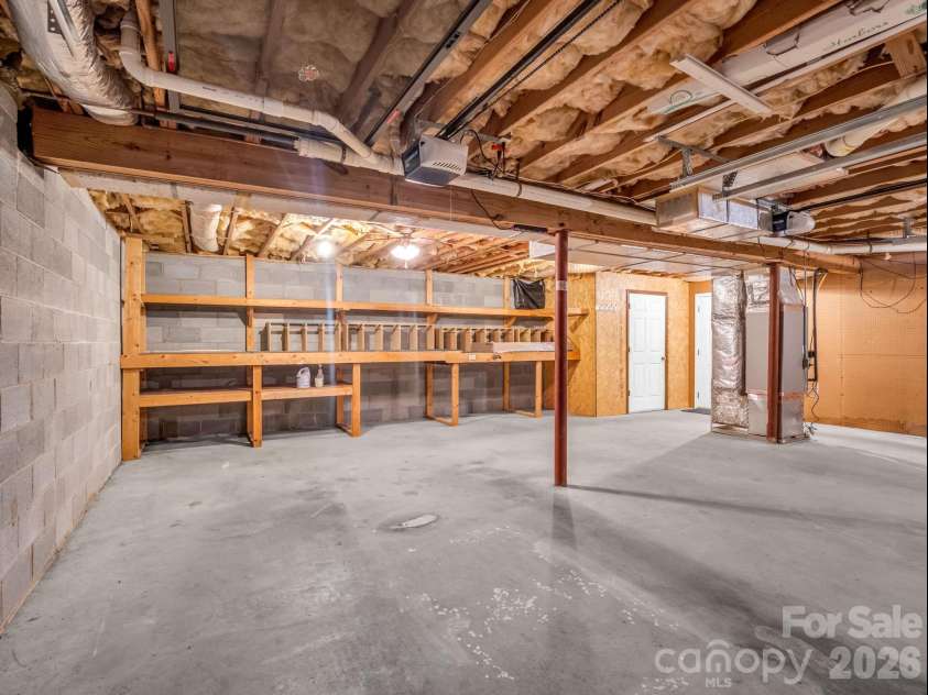 156 Deer Run, Hendersonville, NC 28739.  MLS# CAR4397683, YatesRealty ID 22616. Garage & Workshop Area
