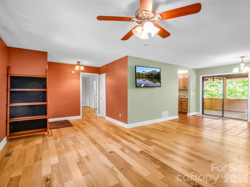 156 Deer Run, Hendersonville, NC 28739.  MLS# CAR4397683, YatesRealty ID 22616. Living Room & Dining Area