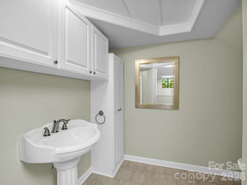 156 Deer Run, Hendersonville, NC 28739.  MLS# CAR4397683, YatesRealty ID 22616. Lower-Level Half Bath