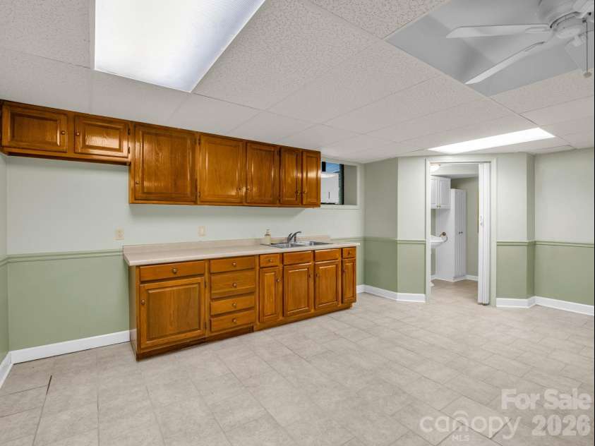 156 Deer Run, Hendersonville, NC 28739.  MLS# CAR4397683, YatesRealty ID 22616. Lower-Level Partial Kitchen