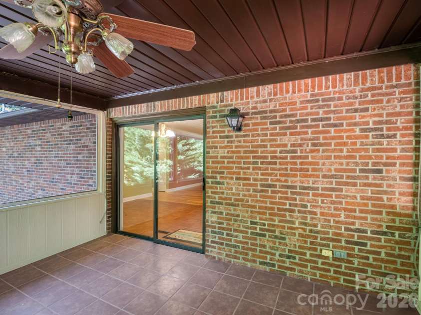 156 Deer Run, Hendersonville, NC 28739.  MLS# CAR4397683, YatesRealty ID 22616. Screened Porch