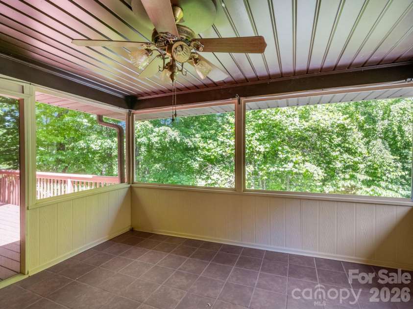 156 Deer Run, Hendersonville, NC 28739.  MLS# CAR4397683, YatesRealty ID 22616. Screened Porch
