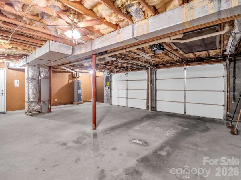 156 Deer Run, Hendersonville, NC 28739.  MLS# CAR4397683, YatesRealty ID 22616. Two-Car Garage