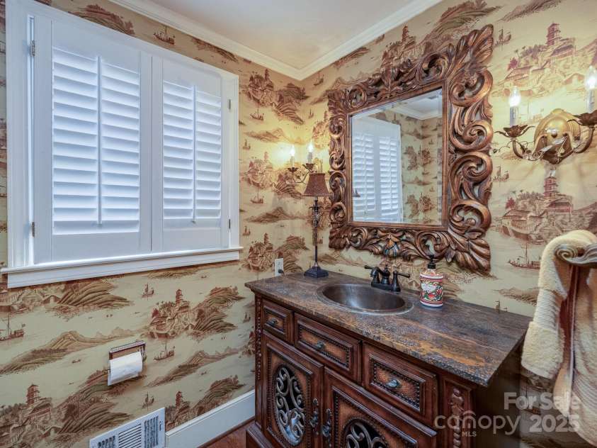 211 Liberty Street, Winnsboro, SC 29180.  MLS# CAR4235636, YatesRealty ID 22618. Main Level Powder Room