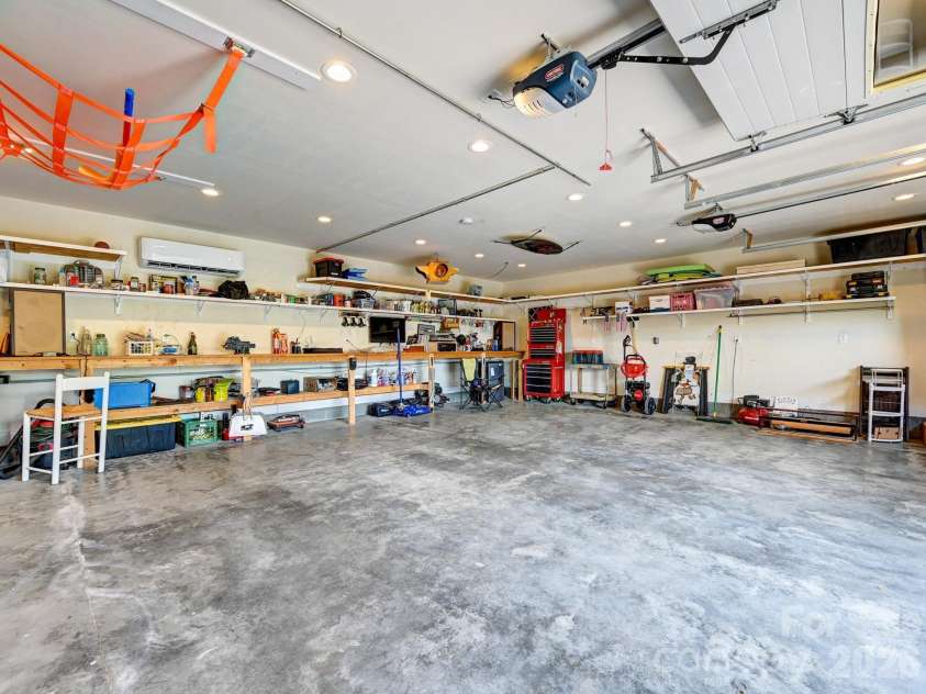 44 Dane Acres Drive, Alexander, NC 28701.  MLS# CAR4368207, YatesRealty ID 22624. 3 car garage with half bath and heat/ac