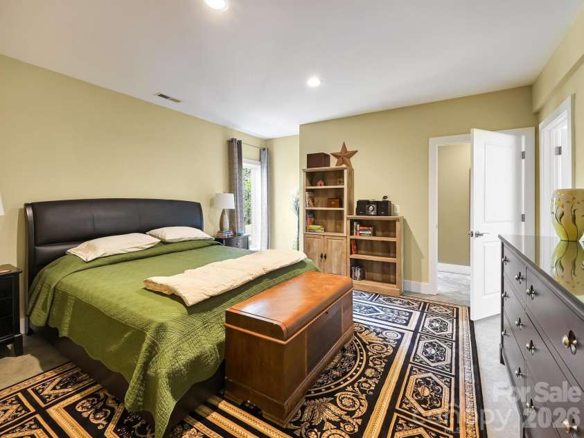44 Dane Acres Drive, Alexander, NC 28701.  MLS# CAR4368207, YatesRealty ID 22624. Basement bedroom with walk-in closet