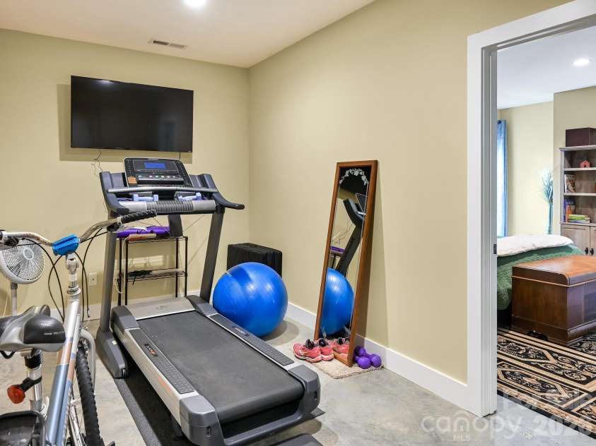 44 Dane Acres Drive, Alexander, NC 28701.  MLS# CAR4368207, YatesRealty ID 22624. Basement gym/bonus space