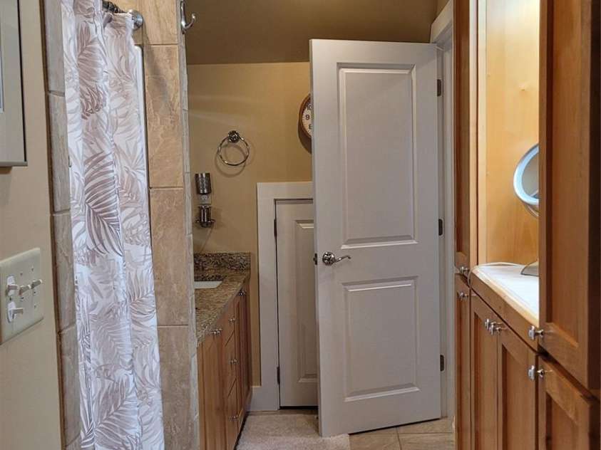 44 Dane Acres Drive, Alexander, NC 28701.  MLS# CAR4368207, YatesRealty ID 22624. Carriage House Bathroom with custom cabinetry