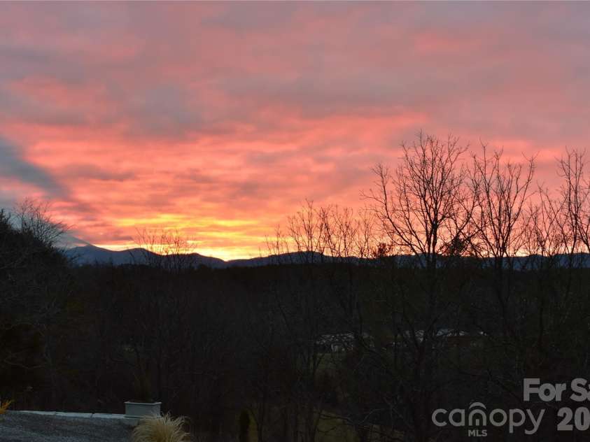 44 Dane Acres Drive, Alexander, NC 28701.  MLS# CAR4368207, YatesRealty ID 22624. Sunrise view from the kitchen