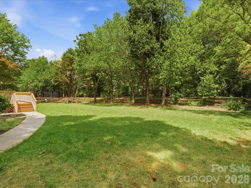 1101 Baldwin Lane, Waxhaw, NC 28173.  MLS# CAR4378491, YatesRealty ID 22625. Large Private Rear Yard