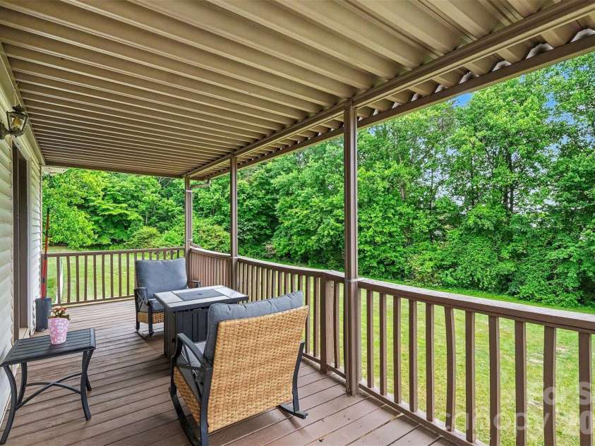 2960 Lavina Lane, Claremont, NC 28610.  MLS# CAR4380522, YatesRealty ID 22626. Wrap around deck