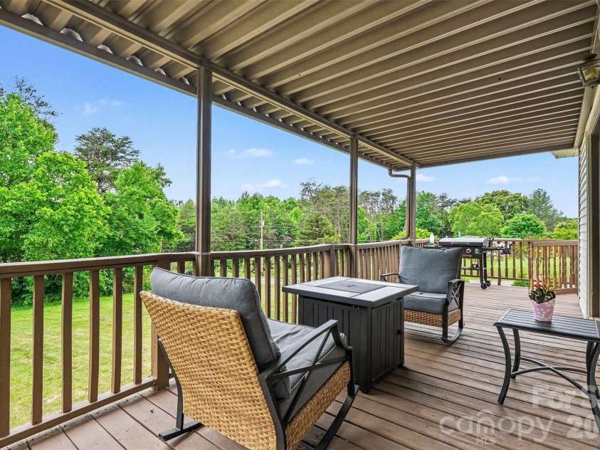2960 Lavina Lane, Claremont, NC 28610.  MLS# CAR4380522, YatesRealty ID 22626. Wrap around deck