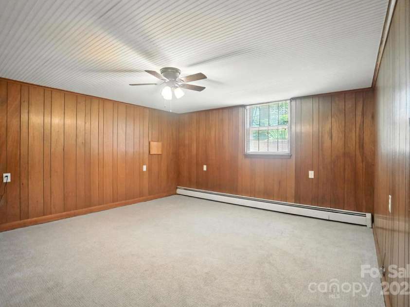 900 Nance Street, Kannapolis, NC 28083.  MLS# CAR4272286, YatesRealty ID 22628. Basement Den