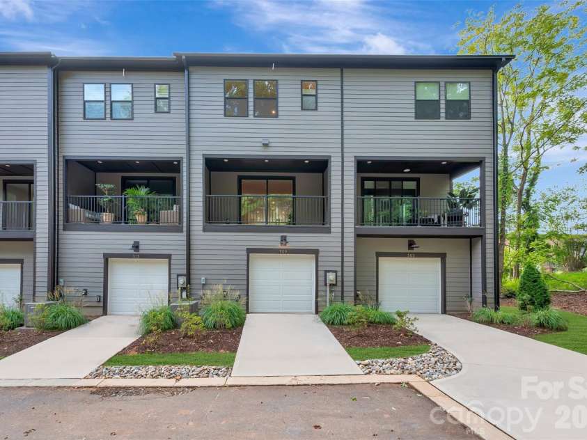 309 Old Town Village Road, Waxhaw, NC 28173.  MLS# CAR4304422, YatesRealty ID 22630. 2-bay rear load garage