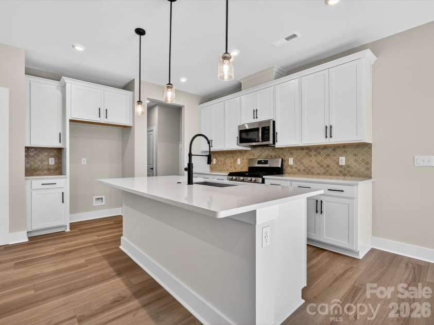 212 Halemarg Drive, Belmont, NC 28012.  MLS# CAR4305679, YatesRealty ID 22631. Chef Inspired Kitchen with Large Island