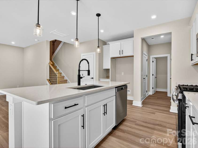 212 Halemarg Drive, Belmont, NC 28012.  MLS# CAR4305679, YatesRealty ID 22631. Chef Inspired Kitchen with White Cabinets and Black Hardware Elements