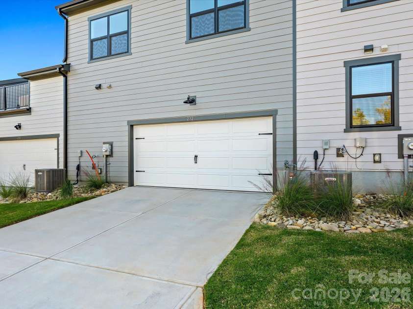 212 Halemarg Drive, Belmont, NC 28012.  MLS# CAR4305679, YatesRealty ID 22631. Rear Load 2 Bay Garage