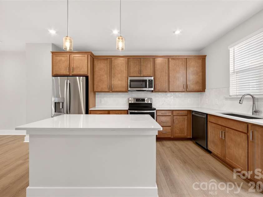 1530 Levy Way, Charlotte, NC 28205.  MLS# CAR4318066, YatesRealty ID 22632. Quartz Countertops & Custom Cabinetry
