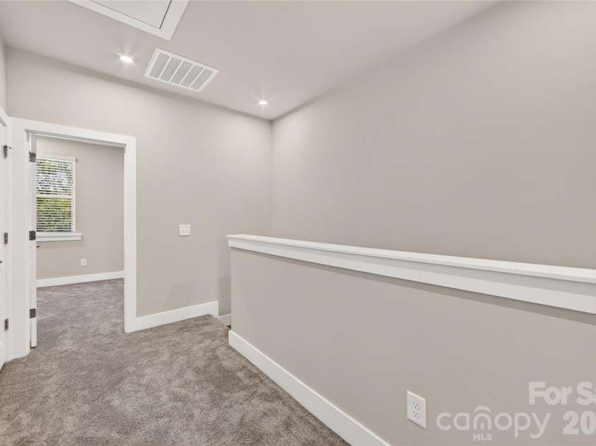 1530 Levy Way, Charlotte, NC 28205.  MLS# CAR4318066, YatesRealty ID 22632. Third Floor Landing with Laundry Closet