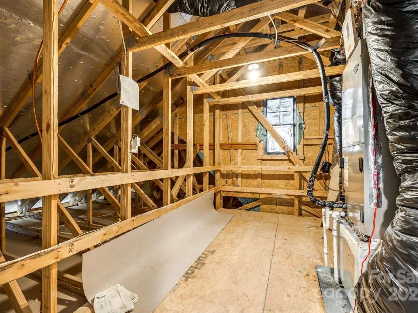 124 Rosebay Drive, Mooresville, NC 28117.  MLS# CAR4246450, YatesRealty ID 22636. Attic storage