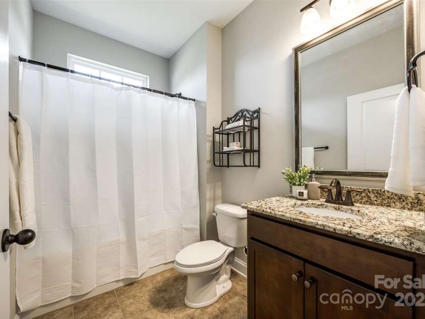 124 Rosebay Drive, Mooresville, NC 28117.  MLS# CAR4246450, YatesRealty ID 22636. Guest bath
