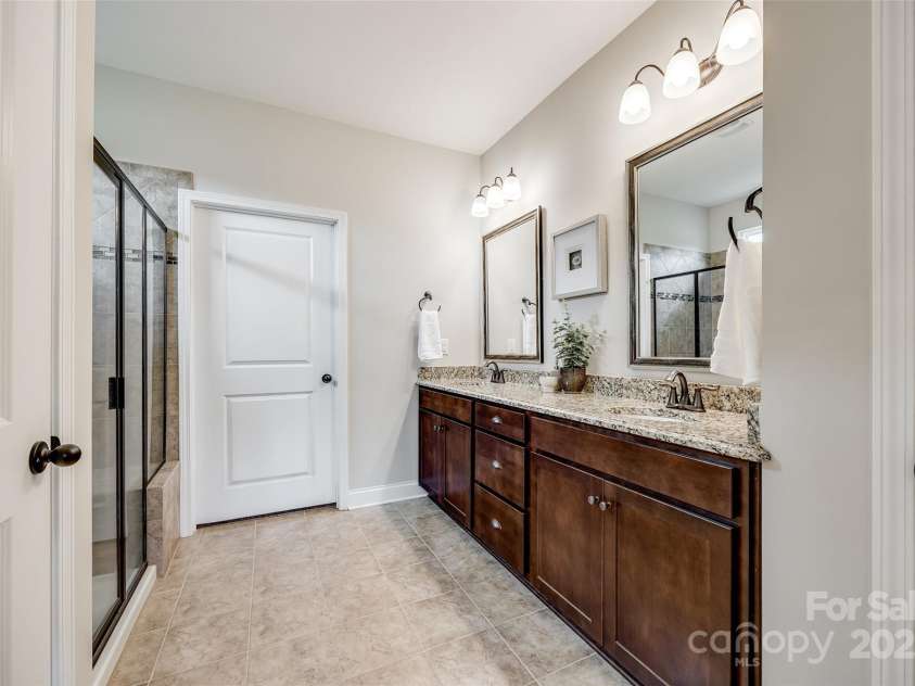124 Rosebay Drive, Mooresville, NC 28117.  MLS# CAR4246450, YatesRealty ID 22636. Primary bath