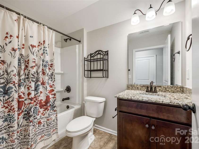 124 Rosebay Drive, Mooresville, NC 28117.  MLS# CAR4246450, YatesRealty ID 22636. Upstairs bath