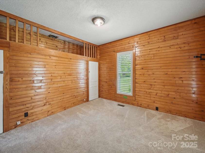 828 Main Street, Mount Pleasant, NC 28124.  MLS# CAR4264431, YatesRealty ID 22637. Bedroom 2 on Main with walk-through closet