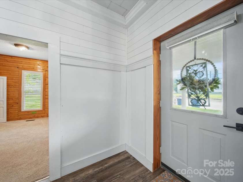 828 Main Street, Mount Pleasant, NC 28124.  MLS# CAR4264431, YatesRealty ID 22637. Entry Hall w/ raised ceilings and molding detail