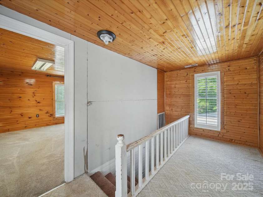 828 Main Street, Mount Pleasant, NC 28124.  MLS# CAR4264431, YatesRealty ID 22637. Hallway to Bedroom 4 on 2nd Floor