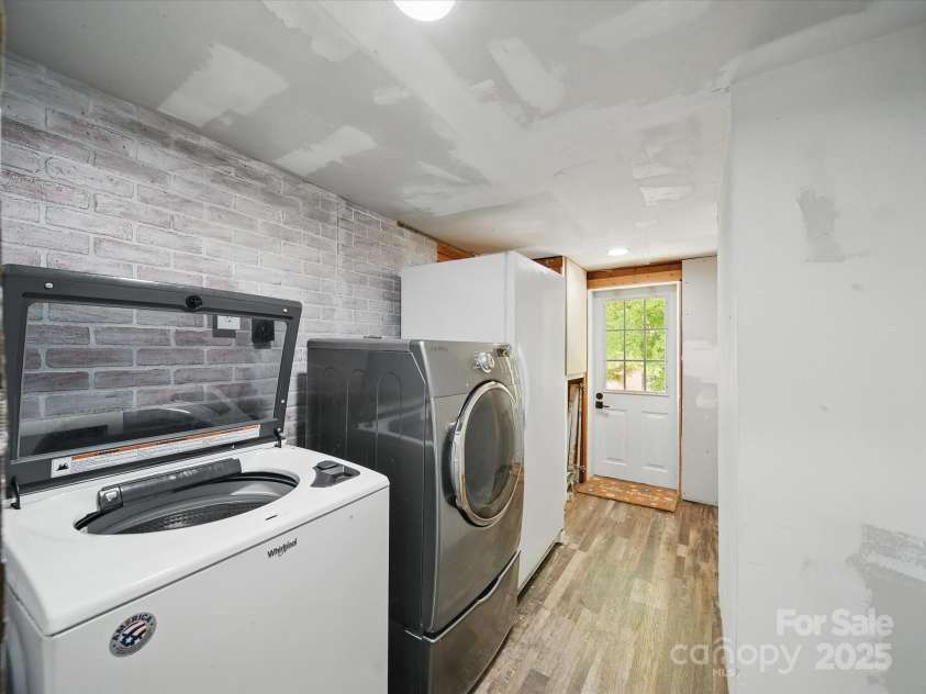828 Main Street, Mount Pleasant, NC 28124.  MLS# CAR4264431, YatesRealty ID 22637. Mud Room w/ exterior door leading to the 1.15 acre yard