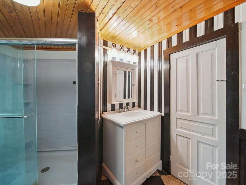 828 Main Street, Mount Pleasant, NC 28124.  MLS# CAR4264431, YatesRealty ID 22637. Primary Bathroom