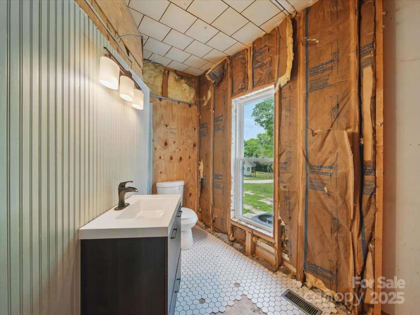 828 Main Street, Mount Pleasant, NC 28124.  MLS# CAR4264431, YatesRealty ID 22637. Unfinished Bathroom 2