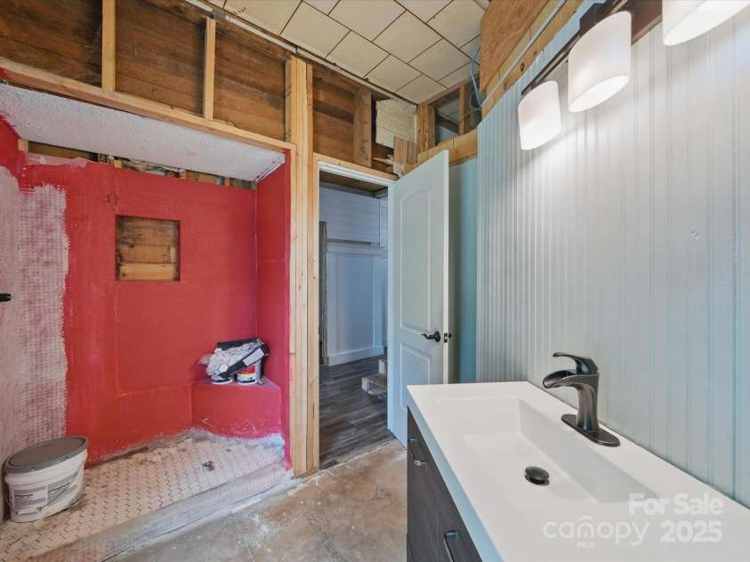828 Main Street, Mount Pleasant, NC 28124.  MLS# CAR4264431, YatesRealty ID 22637. Unfinished full bathroom - permits were not pulled for this.
