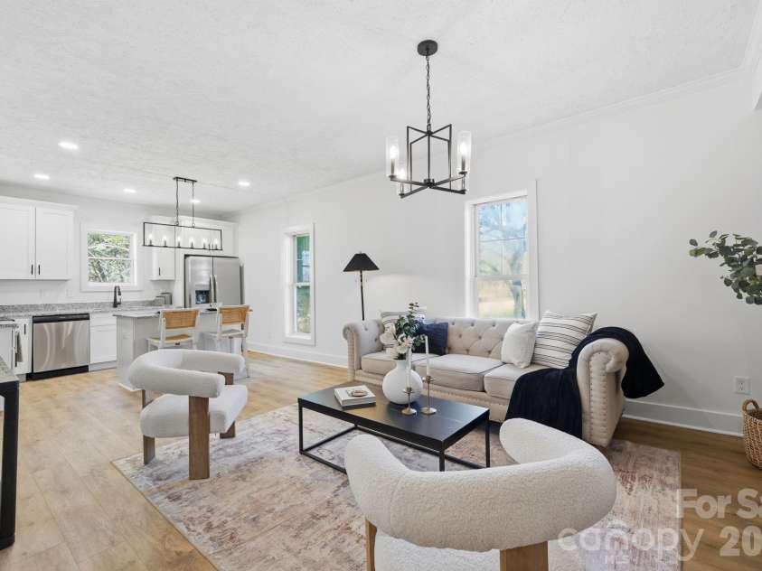 828 Main Street, Mount Pleasant, NC 28124.  MLS# CAR4330011, YatesRealty ID 22637. Living Room/ Dining Area