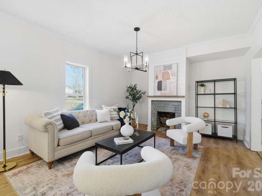 828 Main Street, Mount Pleasant, NC 28124.  MLS# CAR4330011, YatesRealty ID 22637. Living Room/ Dining Area