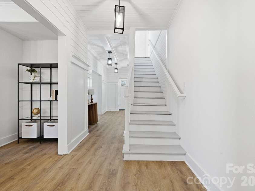 828 Main Street, Mount Pleasant, NC 28124.  MLS# CAR4330011, YatesRealty ID 22637. Main Hallway to Upstairs